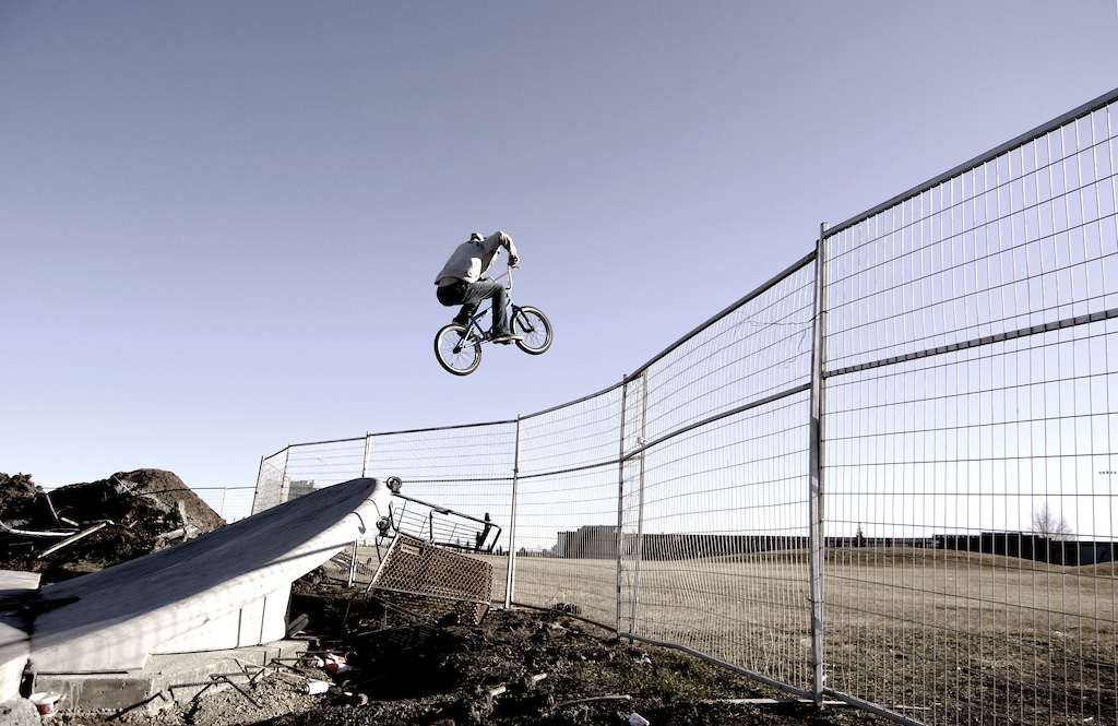 Up and over a 6 foot fence. 

I snapped this too early and unfortunately it's not the type of gap you want to do over and over until you get the perfect shot. Sorry Austin.
