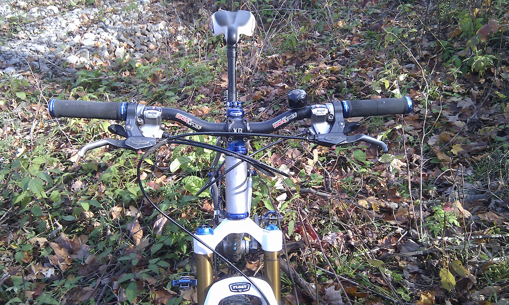 RaceFace Deus XC Bar
Truvative XR Stem
Shimano LX Shifters
Avid SD7 Levers
Chris King No-ThreadSet, Hope Spacers
Bell... that I snapped off with my knee 10 minutes later...