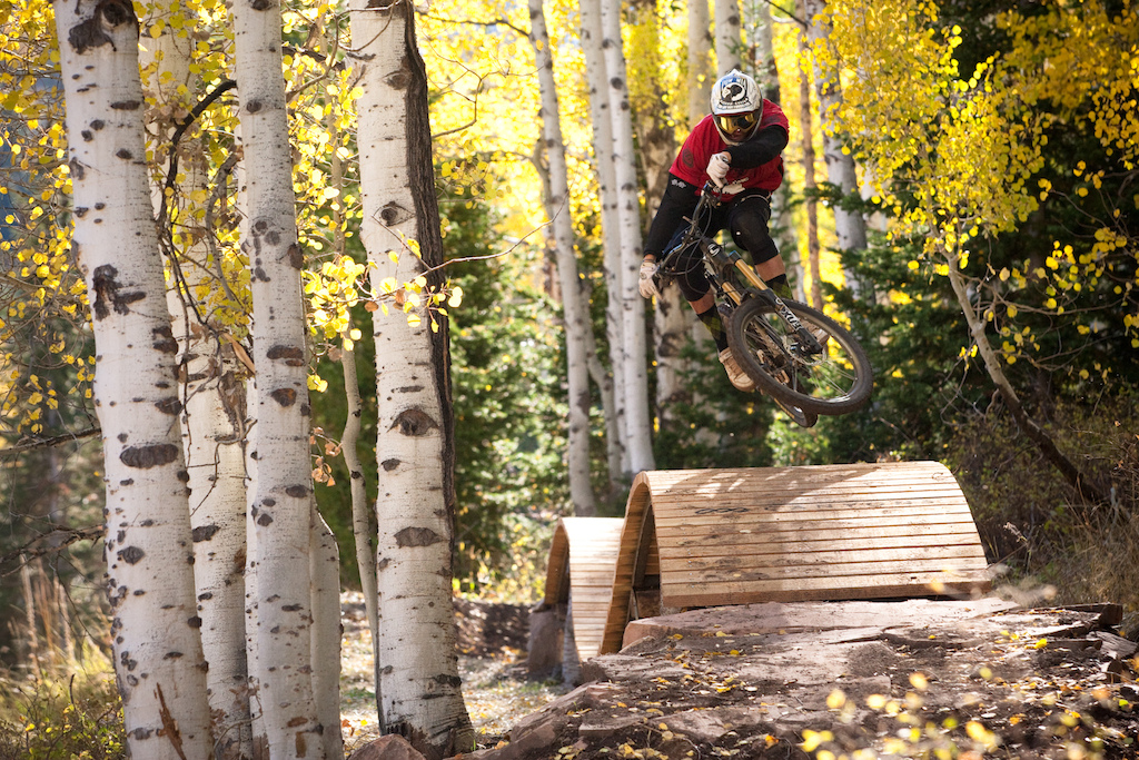 This feature is on the "flying salmon" trail (which is the beginner trail) at Canyons resort. This trail is loaded with berms, rollers, and roller sets that can be double and tripled up. Here CVD keeps it stylin' on the roller coaster.