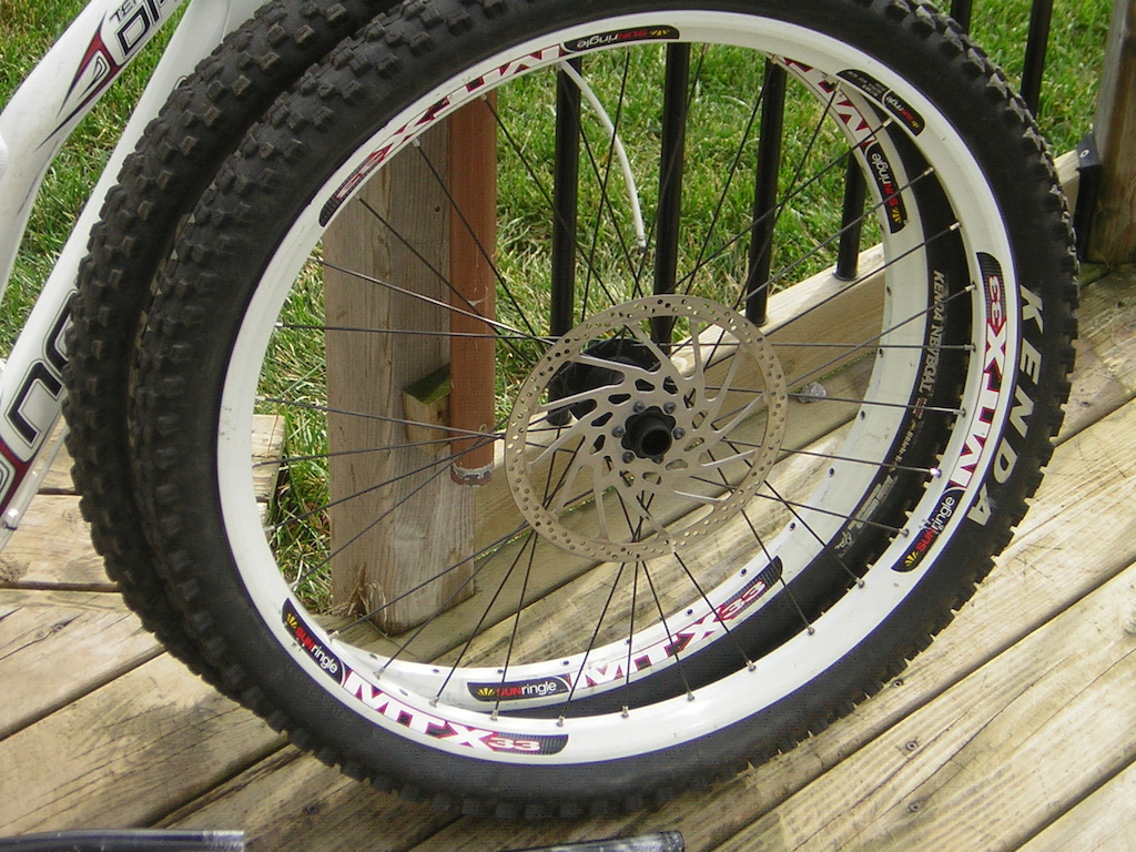 MTX 33 front &amp; rear hoops, 32H Kenda Nevegal 2.5 tires, both ridden on season, front is 90% and rear has quite a few dings.