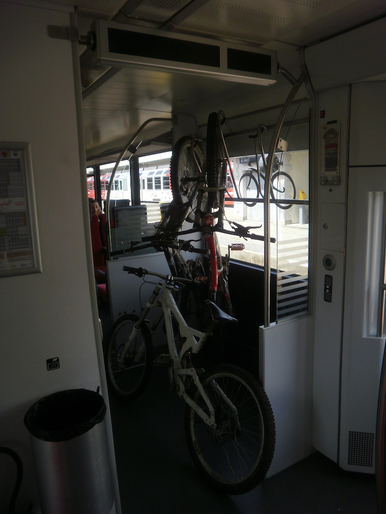 On the train, well equipped for bikes.