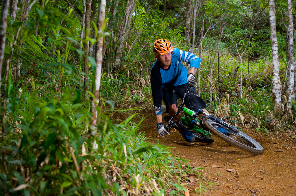 Seb Kemp rides his bike on trails near Blue Mountain in Jamaica at the Jamaica Fat Tyre Festival. This was part of the memorial ride for trail builder Ken Klowak who was killed last year in Mexico.