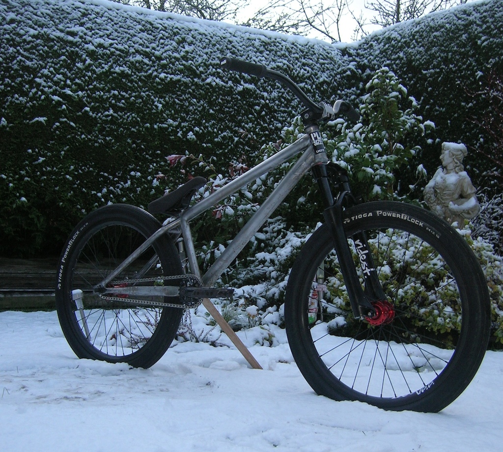 Quick pic in the snow with new seat and grips