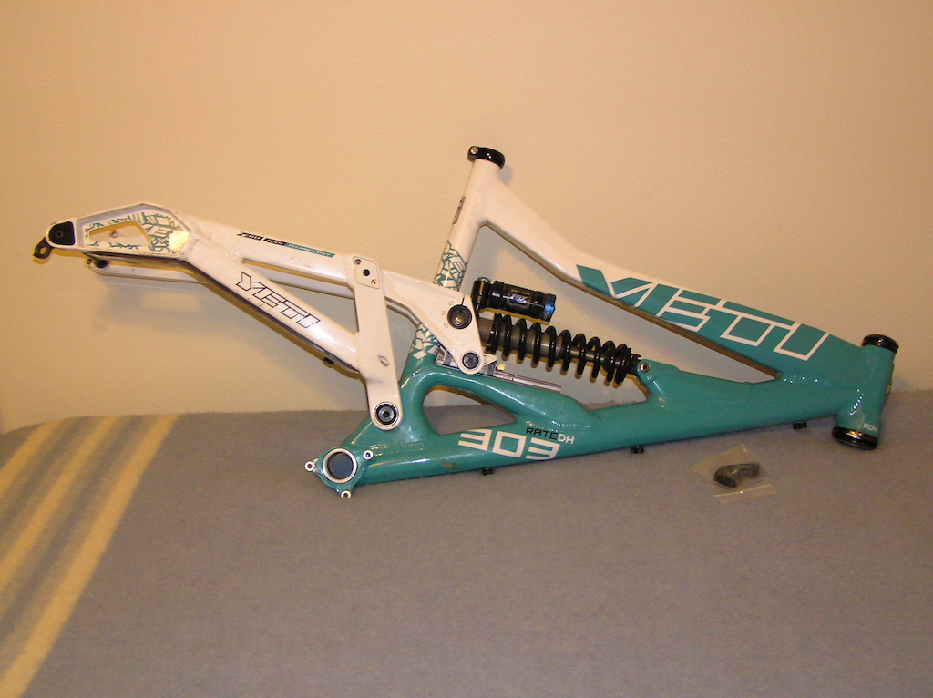 Large 2010 Yeti 303 RDH frame with extra derailleur hanger.