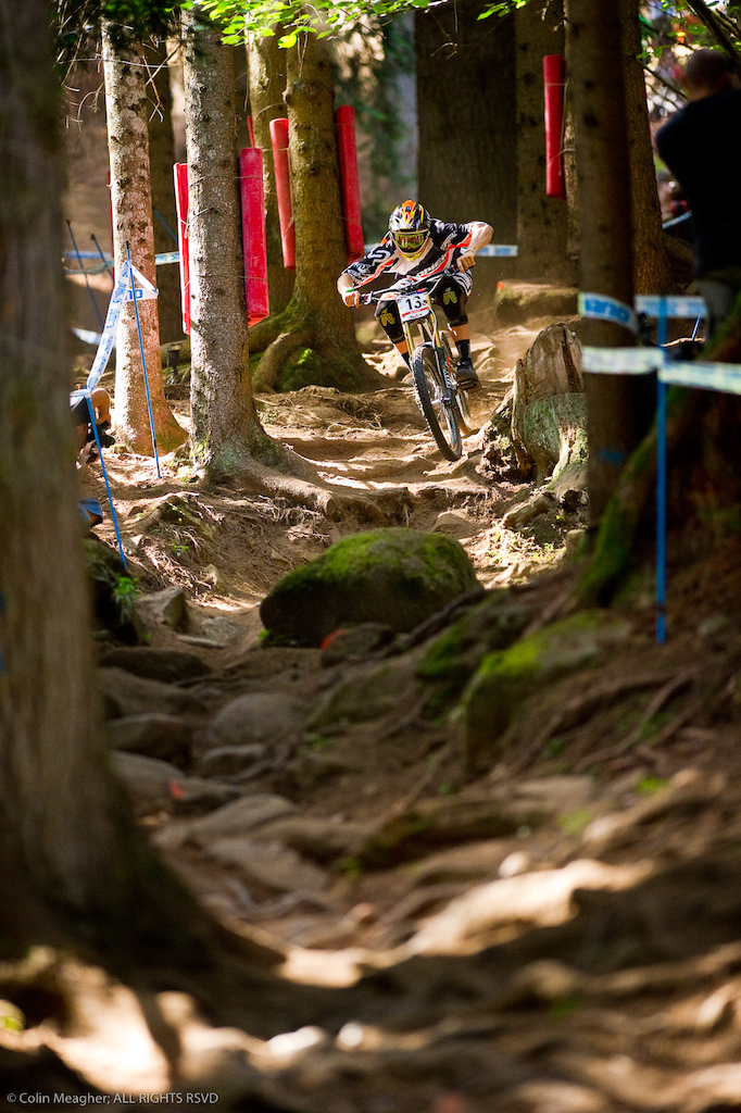 Val di Sole is right up there with Mount St Anne and Ft William when it comes to demanding a complete and focused rider; a single mistake at a place like this can have massive consequences. As a photographer, the most difficult thing at a place like this is finding a shot that illustrates not only how gnarly the track is, but also how graceful and skilled the riders are. This shot of Blenki dancing through this rock and root infested gutter below the main rock garden is one of the few times in 2011 where I feel I truly nailed it.