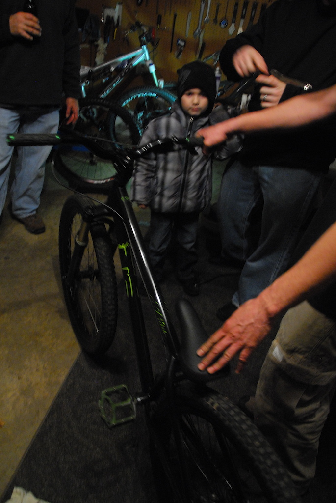 Pedalshop bike Techs wrenching on some of the Crews Rigs.