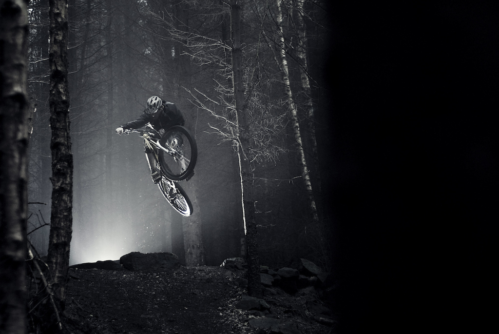 Deep in the heart of the woods, surrounded by an icy lick of fog and an audience of silently swaying trees, Adam Hodgson puts pedal to metal and cuts through the winters mist.