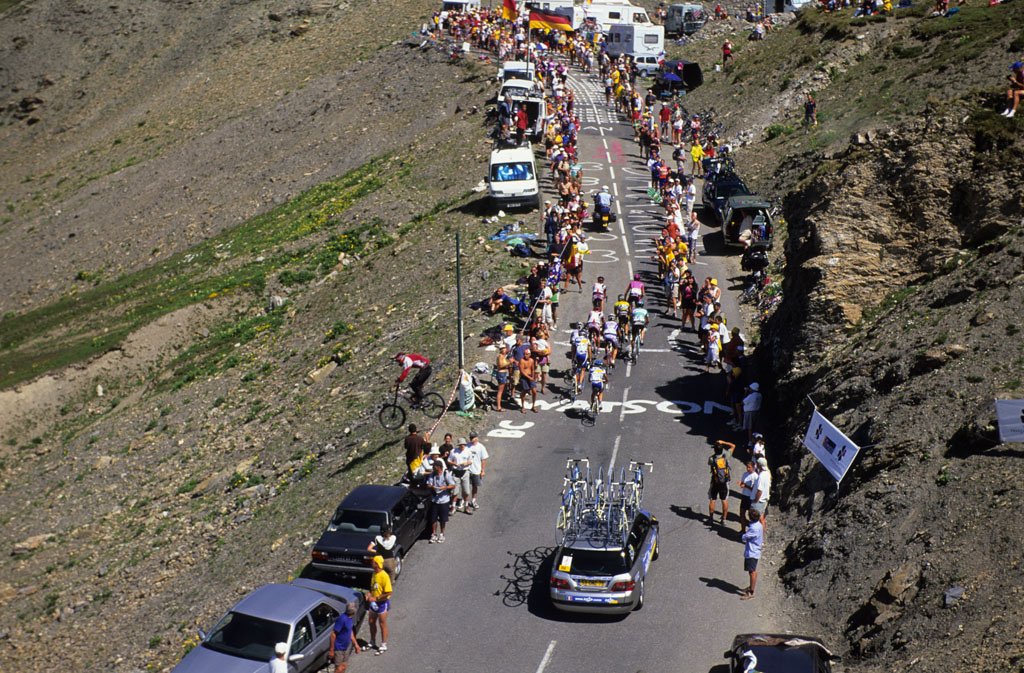 Dave Watson jumping over the pelaton at the Tour de France, Col Galibier, France.

Photo Copyright Scott Markewitz