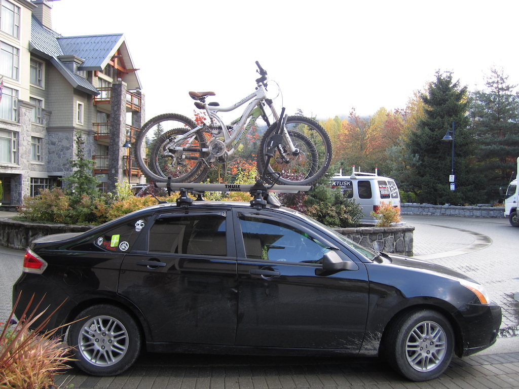 Average car with a sweet Norco and bitchin Kona on the top!!!! Go newlyweds