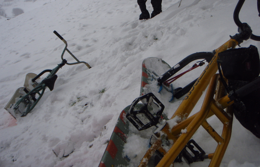 home-made snow-bikes worked perfectly

http://afrotrailsclothing.blogspot.com/2012/02/afro-trails-goes-snow-biking.html