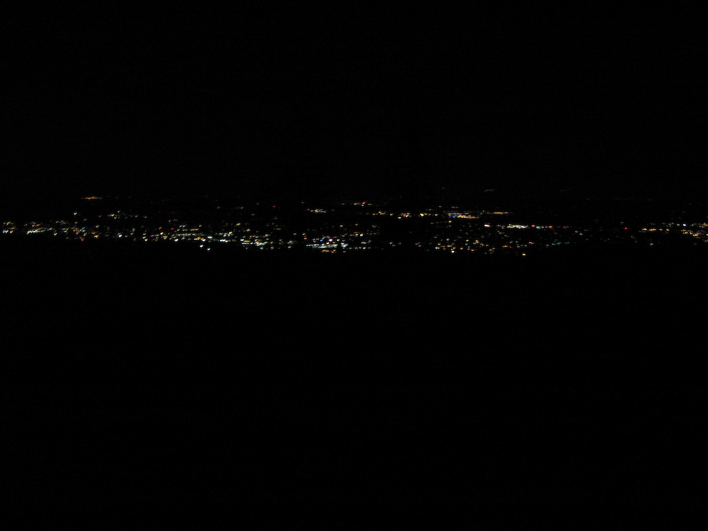 Tok a co-worker for his first night ride over the home town. Sorry for the poor pic just such an awsome ride and veiw, I could see the ski hills up in North Van. And we had a full moon.