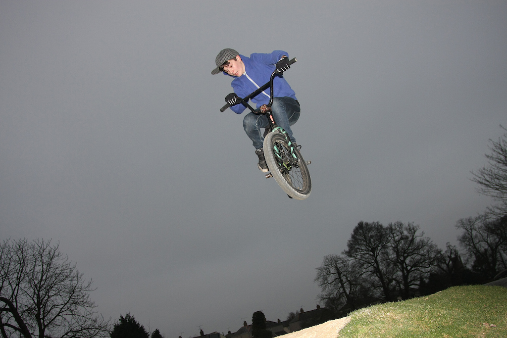 This shot was taken using my Canon 40D. I like the way that the flash has frozen the kid in mid-air, especially at this time of the evening.