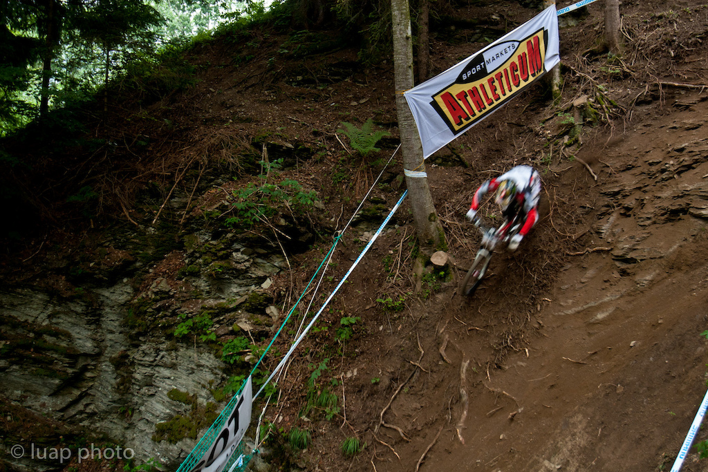 A bunch of shots from the Champery WC a few years back, including a few of US Champ Logan Binggeli  which were used in this interview: Check it out:
http://www.imbikemag.com/issue7/?page=111
In some places this track was just a vertical wall of rock.  Braking here is just pointless.