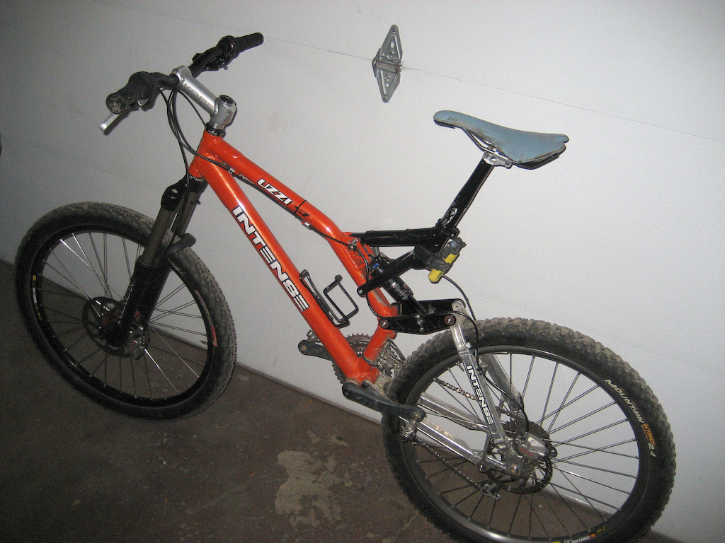 Almost as bought.
Nixon fork
Rear Swinger3w Air 
SLX shock links
6" travel w/ HIGH bottom bracket
