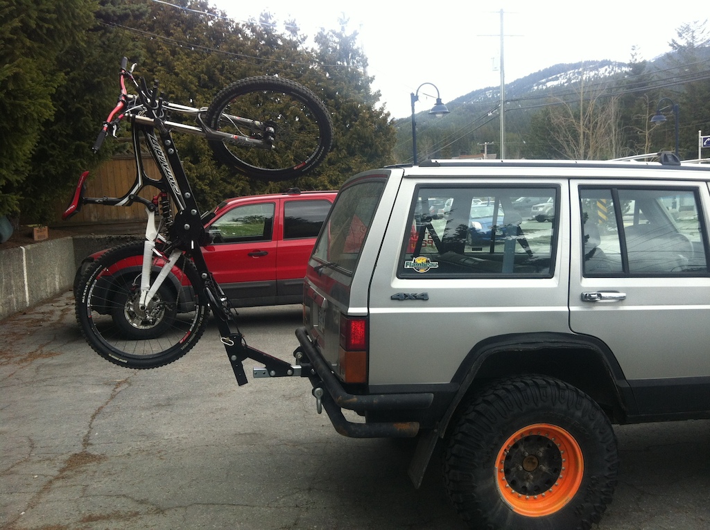 My Jeep with a NorthShoreRacks.com 4 bike rack. also my V10 carbon.