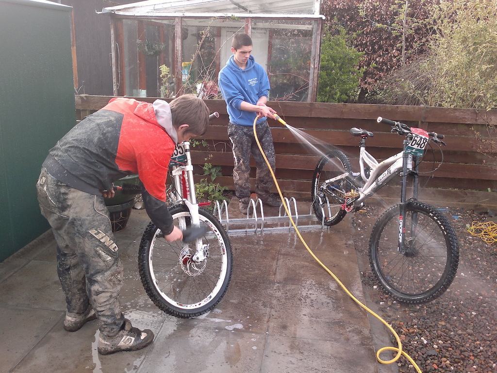 cleaning the bikes after the race