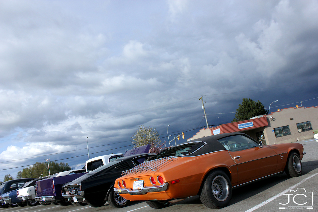 1973 number's matching, medium orange, all original, California blue-plate Camaro with 43,000 original miles on it.