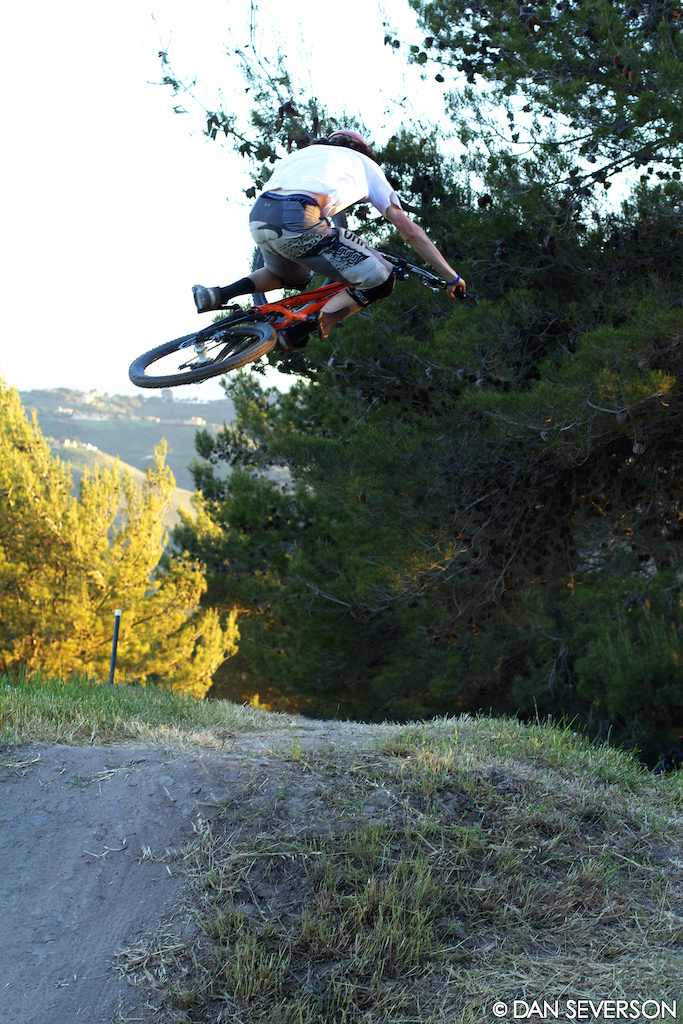 Friday evening at Sea Otter. A few riders were sessioning the jumps on the DH course right before dark.