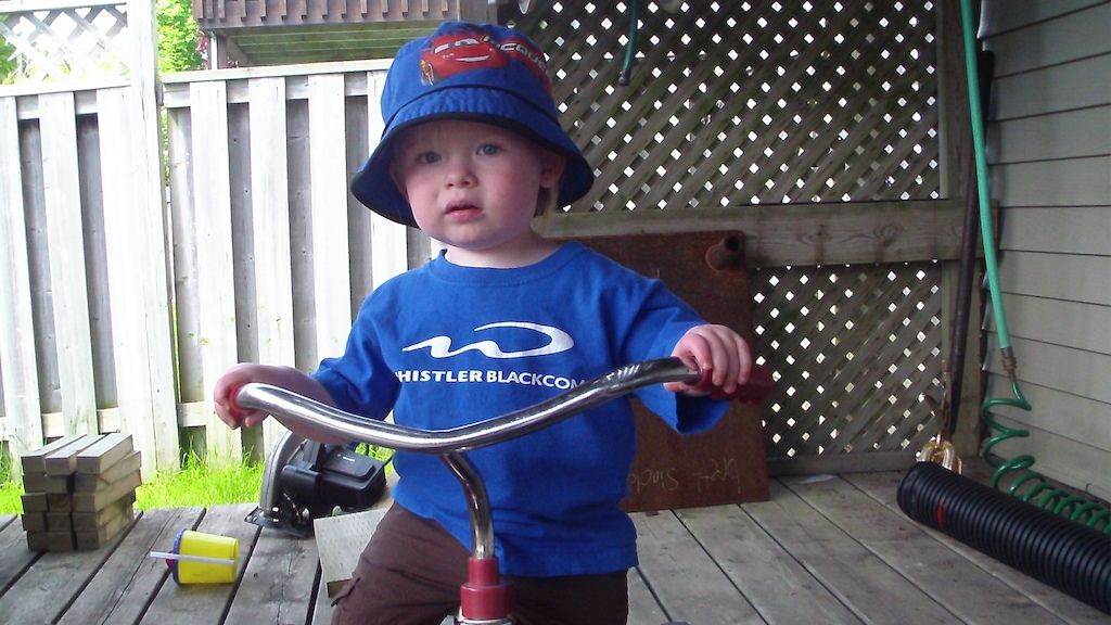 My nephew Jack riding his tricycle.