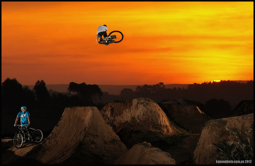 Composite image, Jumps and Rider is real,Taken with D3s this year, Un moved. Sunset with D90 was taken a while ago looking over the golf course during a bushfire. Deitys fresh blood rider Tom Hall Can Boost.