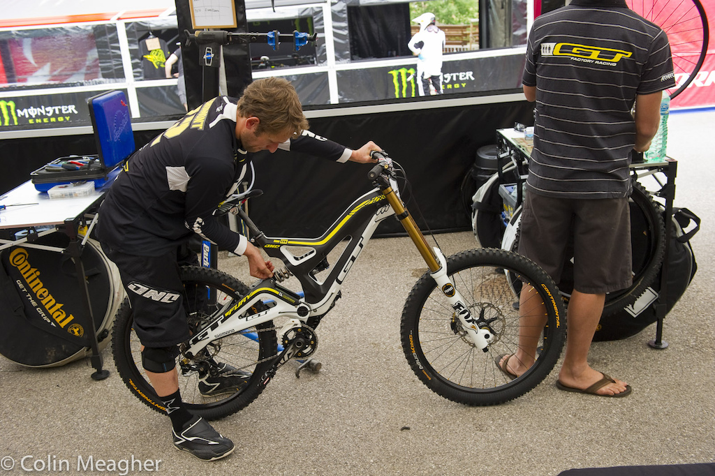 Dialing in exactly what he wants. A lot of riders won t touch their bikes Slugger ain t afraid to get dirty.
