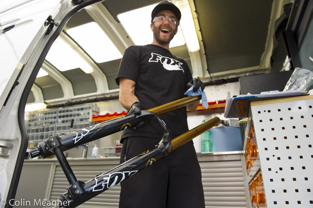 An ecstatic Justin Frey working over Gwin's new RAD 40 forks.