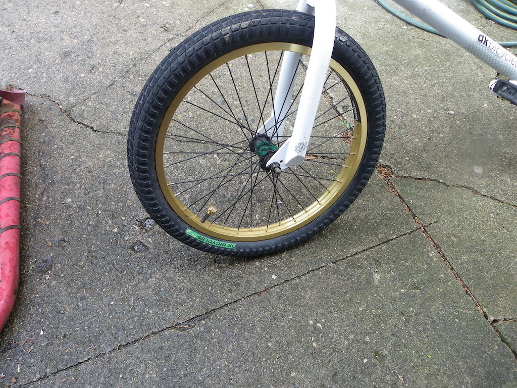 gold rims both wheels great condition. nice cool and gripy treads also very good conditon. and very light and good forks