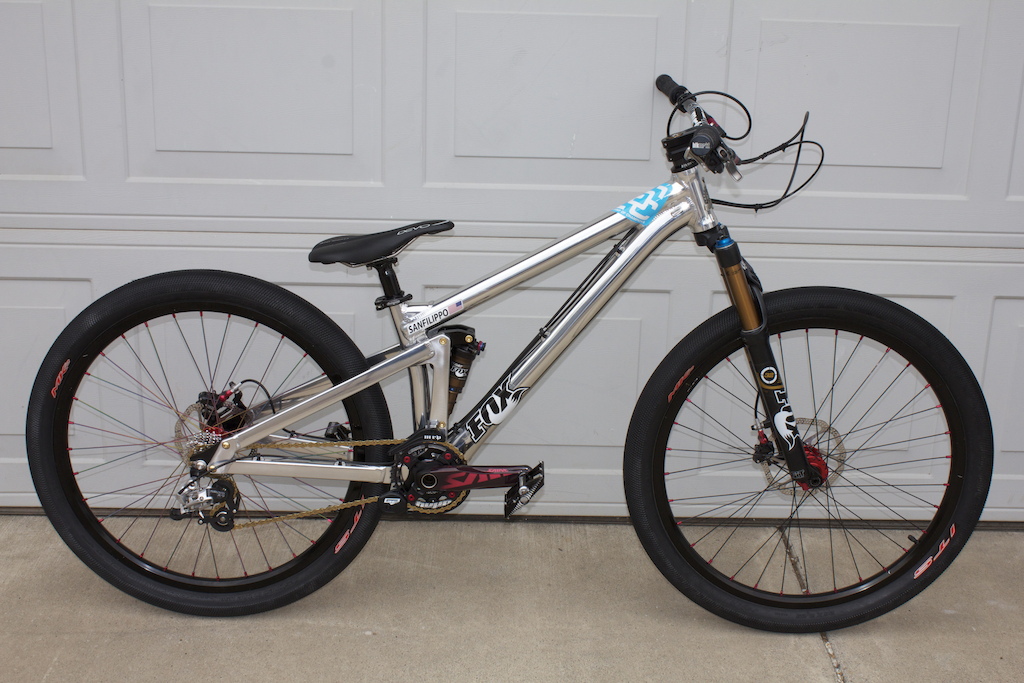 28.85 Pounds. Frame: Black Market Killswitch W/ Headset ~Custom Tuned Fox Suspension~ Fork: 2012 Fox 831 Kashima, 100mm Shock: 2012 Fox Float RP23, Boostvalve Tune 275, Rebound Tune F Rims: Atomlab Pimplite's Hubs: Hope Pro II Evo's, Red Spokes: Rear Atomlab Ti Spokes, Front PIMP Spokes Nipples: Red Atomlab Torque Nipples Tires: Intense Mk2's &amp; Maxxis Larsen TT's Brakes: Avid Elixir CR's Brake Rotor's: Avid HS1's 160mm Bars: Blk Mrkt Bada Boom Bars, Uncut Stem: Blk Mrkt Underboss Stem Grips: Blk Mrkt Lock-Down Lock On Grips Cranks: Shimano Saint M810, 170mm Crankskins: Red Transparent, Name &amp; Flag Frame Bottom Bracket: Chris King, Red Pedals: Ti Axle Straitline AMP Chainring: Hope 34t Chainring Bolts: e*13, Red Chainguide: MRP G2 SL Mini Chain: KMC X9SL Chain Cassette: Shimano Ultegra 11-23 Derailleur: Sram X9 Short Cage Shifter: Sram X7 Cable/Housing: Jagwire Seat: WTB Devo Ti Railed, Thinline Seat Post: Northshore Praxys Seat Post Clamp: 34.9 Hope QR Clamp Mudguard: RRP Neoguard, XS