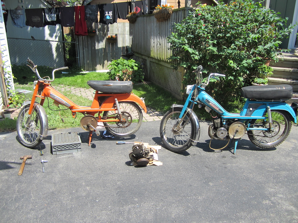 New project moped....needs a little TLC to get it running... nothing majorly wrong with it.

Orange one is a donor for parts