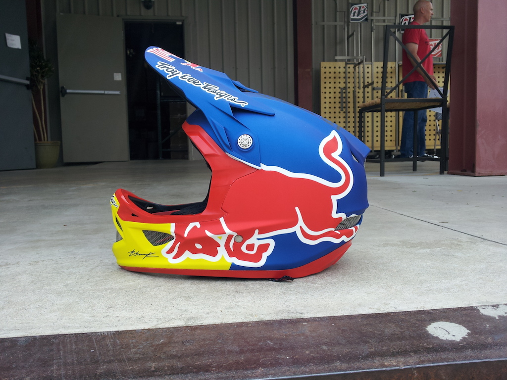 Brandon Semenuks new Troy Lee Designs D3  redbull paint job. We did a satin metallic blue finish, red trim, oversized red bull logos, and carbon 'semenuk' apparel logo on top (Brandons new TLD collection of apparel coming in fall 2012). Super sick.