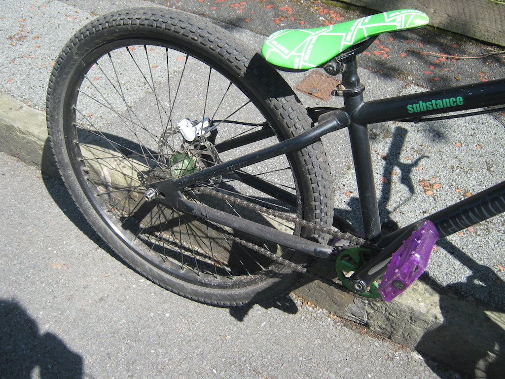 View Of Blank BMX Seat, Avid Brake, Rear Wheel