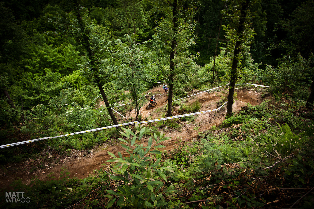 Dropping into the final curves practicing for the Pogno Superenduro.