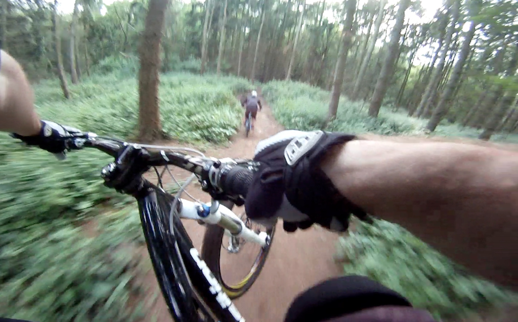A snapshot taken from my GoPro video footage (chest mount) of an evening ride up Badbury Dump... hitting one of the many jumps!...