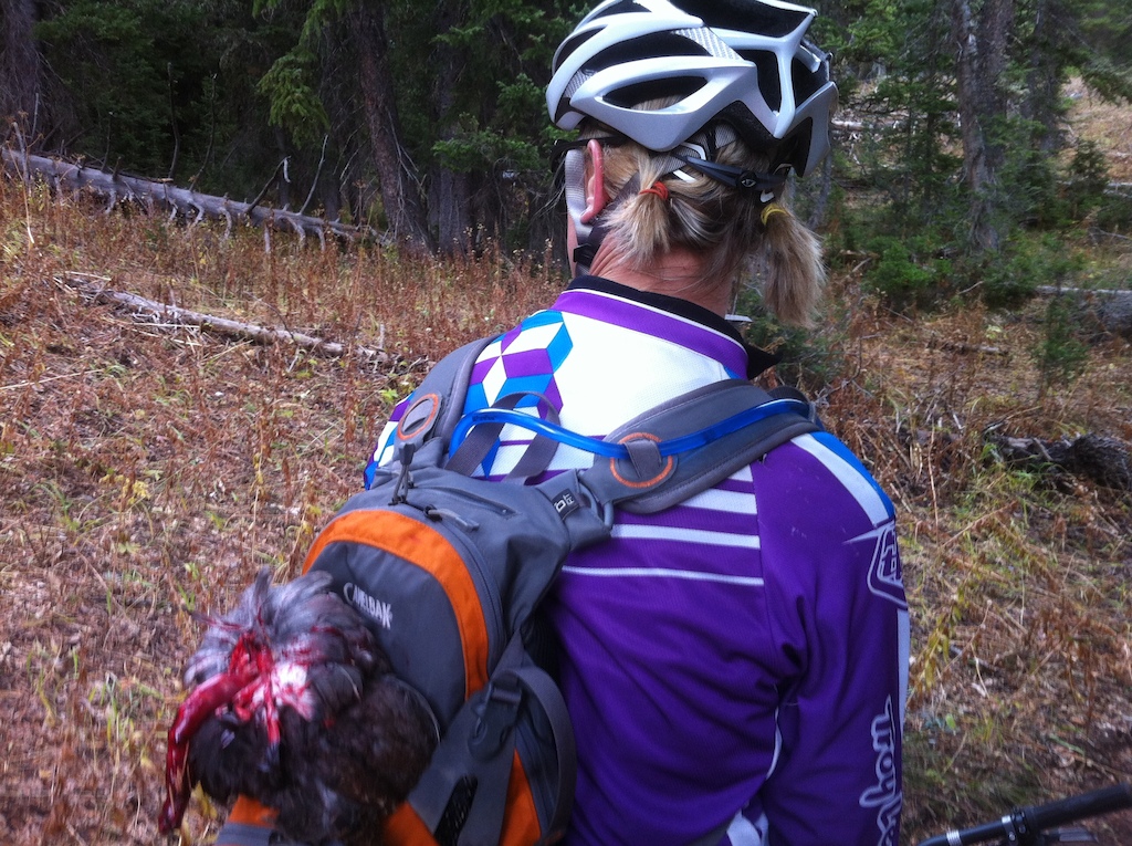 out onna ride and a Grouse was just off the trail so i chased it down, killed it, plucked it, and roasted it;)