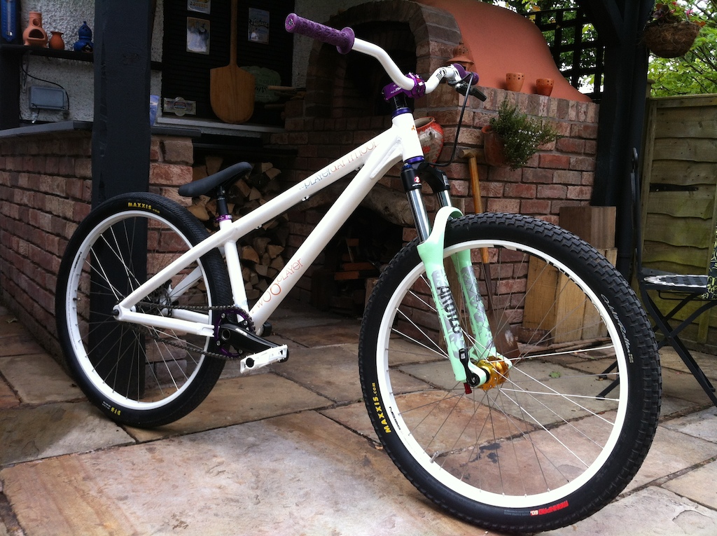 Dartmoor Two6player finished!

Spec
Frame - 2011 Dartmoor Two6player
Fork - Rock Shox Argyle 409
Wheels - NS Fundamentals on Hope Pro II Front and Halo Spindoctor Rear hubs
Cranks/BB - Shimano Saint M800
Headset - Octane One Warp 
Bars - Blk Mrkt Bada Boom 
Stem - DMR Swarm 
Grips - Spank Tuggjob
Saddle - Dartmoor Lite Combo
Pedals - Wellgo V8
Chain - KMC Z510HX
Chainring - e13 G-Ring 33t
Tyres - Maxxis DTH and Holy Roller
Brake - Hayes HFX-9 Carbon 10th Anniversary Ltd Edition
Seat clamp - Deity Cinch