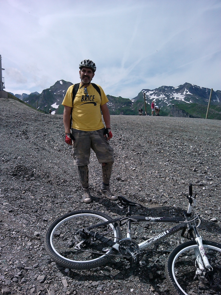 Dad at the top of chatel bike park uplift, with rental bike