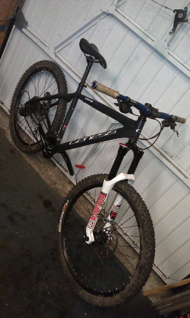 my genesis now with new forks bars wheels,cranks and stem nearly finished goin to be a sweet trail bike !