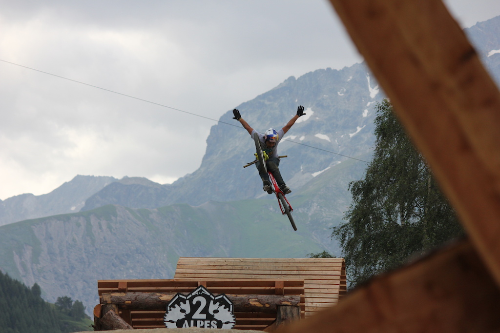 Slopestyle course designer Yannick Granieri throwing a huge tuck no hander