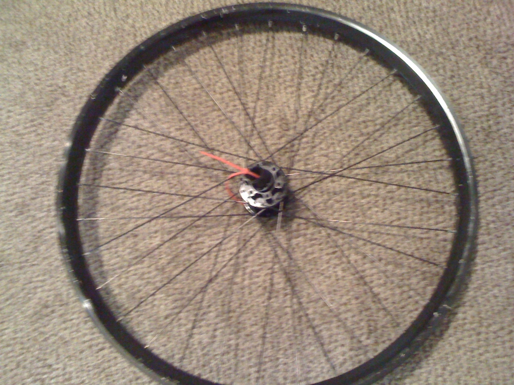 front, a few small dent/chips. it is a used dh wheel set....