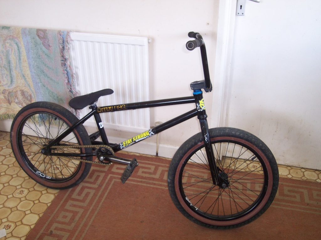 my bmx after a ride, back rim looks horrible though oh and its my new frame, getting new tyres soon.