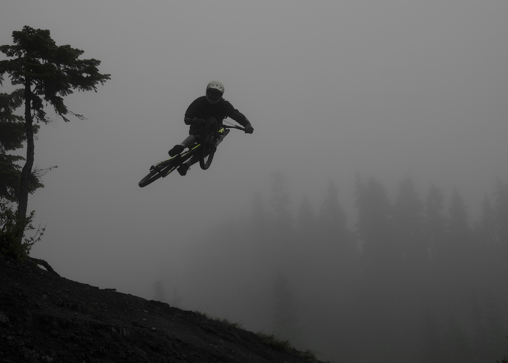 Jeremy hitting the Original Sin hip on a foggy day in Whistler. Photo by Neil