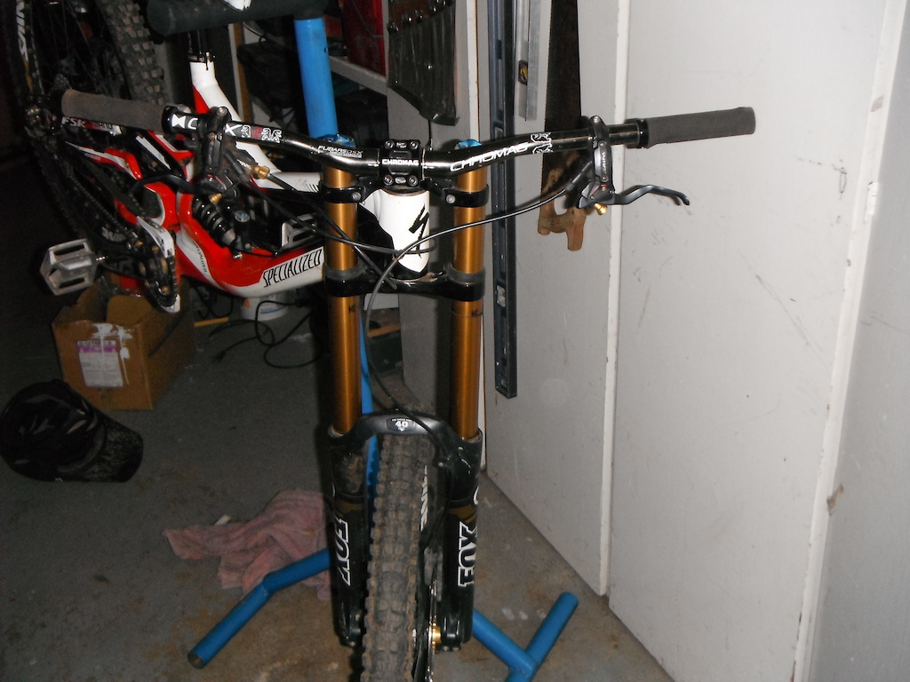 2012 demo 8 two full saint setup. chromag seat, stem, and bars fox 40s kashima coated and a fox rc4 in the back