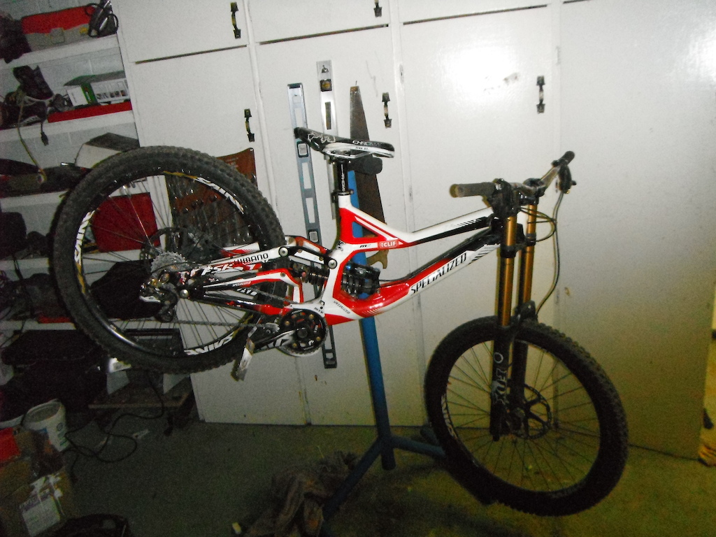 2012 demo 8 two full saint setup. chromag seat, stem, and bars fox 40s kashima coated and a fox rc4 in the back