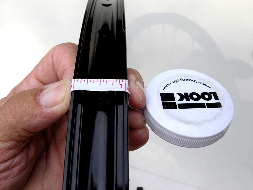 Measure the width of the rim outside to outside. This is how wide your sealing tape will need to be sized in order to span the ID of the rim surface and seal correctly.
