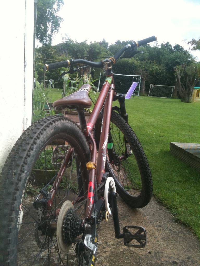my p2 with new maxxis crossmark tires, outland  grips, superstar bottom bracket and white chainstay bashring thingy