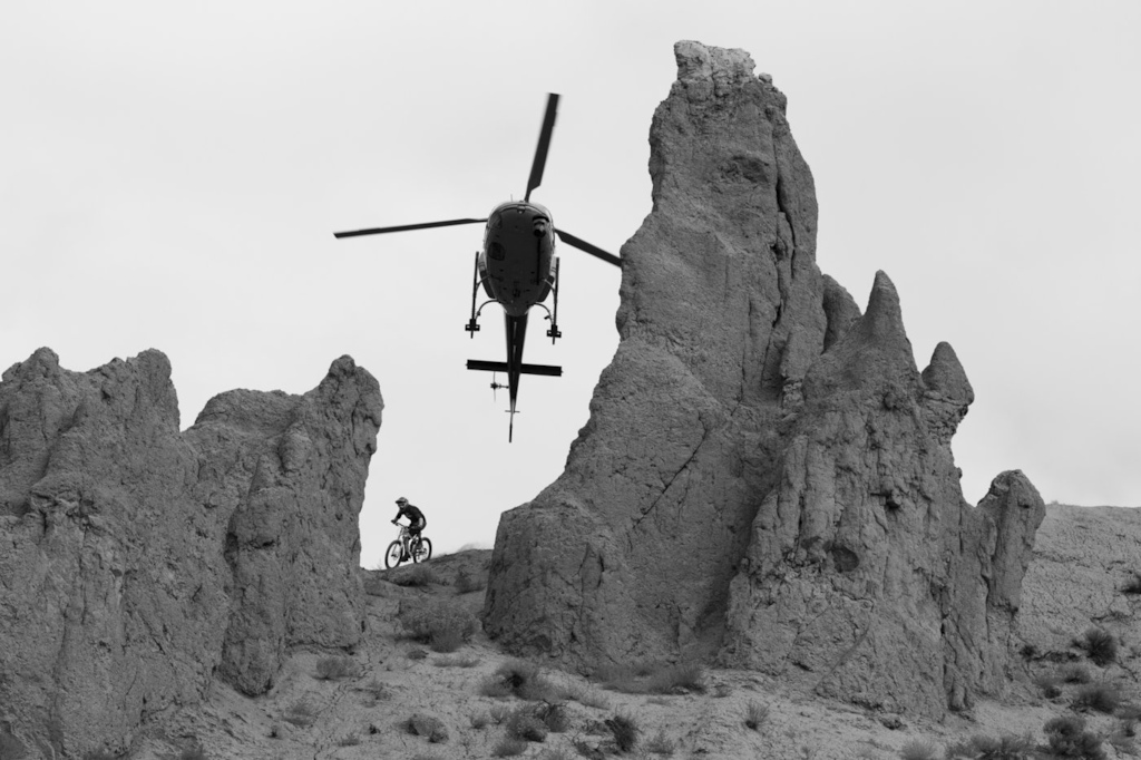 Kurt Sorge on the run being chased by a helicopter