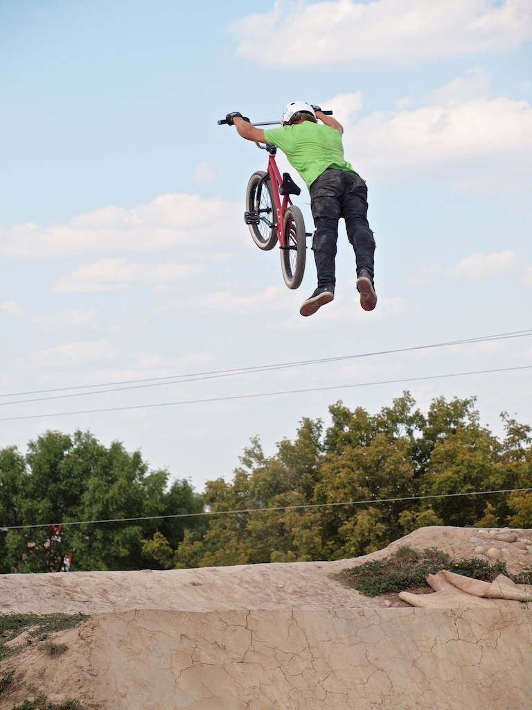 Superman over the dirt jumps at Mclennan Park in Kitchener.