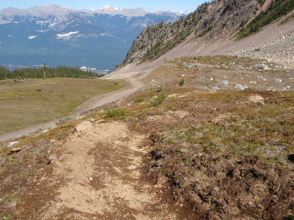 In early summer, the treacherous 10Rd is the only route through the alpine until the snow melts. Well, we figured out what melts first and just built a trail there. Enjoy it next July.