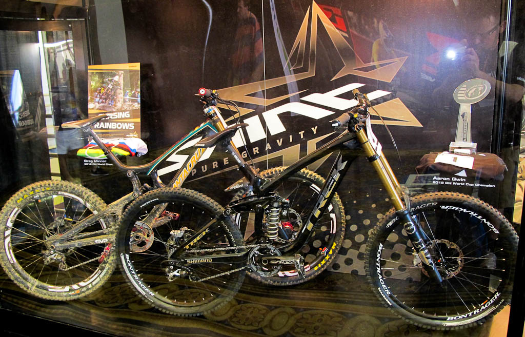 Greg Minnaar and Aaron Gwin's bikes at the SAINT display.