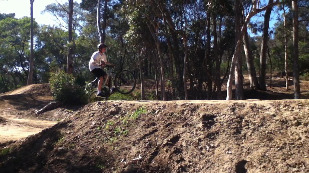 Miniature me taking on the table tops at anglesea bike park in 2009
